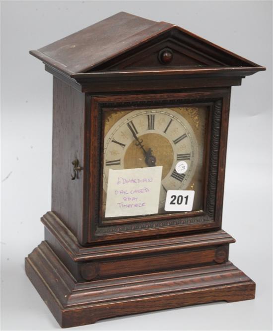 An Edwardian oak cased eight day timepiece, height 28cm